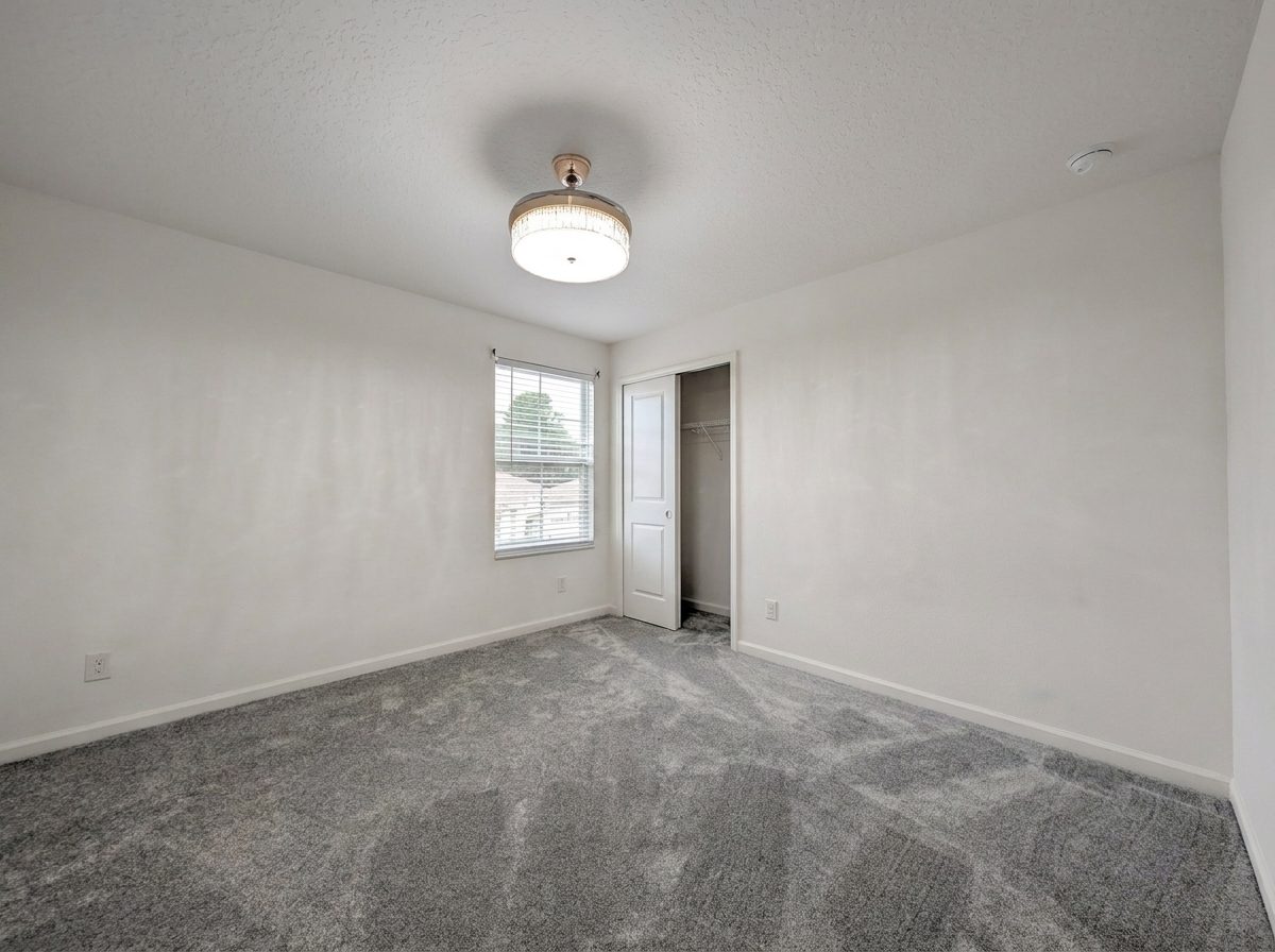 Carpeted bedroom with natural light at 2275 Abilia Aly, Apopka